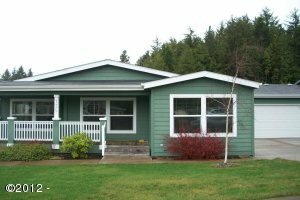 Property Photo:  135 SE Whalesong Drive  OR 97341 