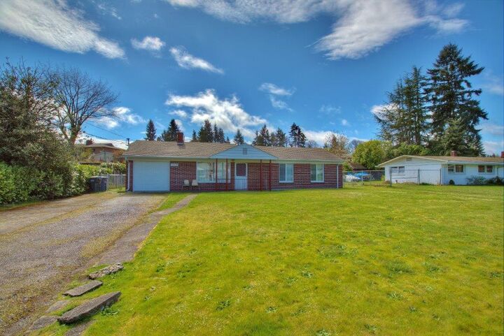 Property Photo:  7910 Leschi Rd SW  WA 98498 