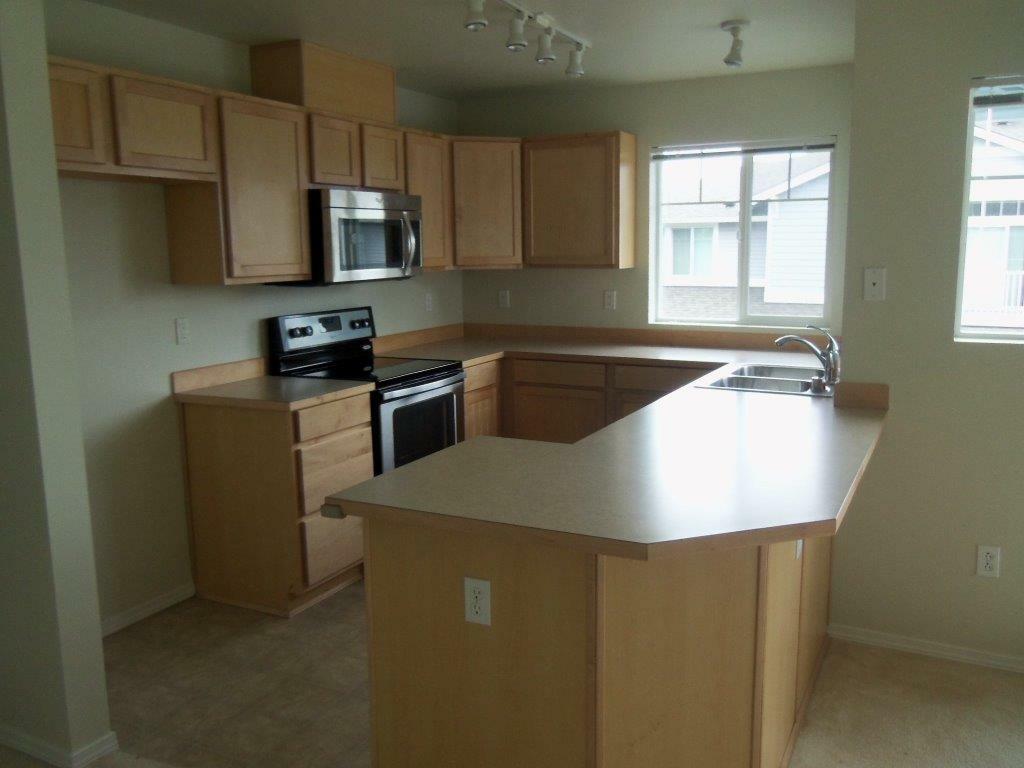 Property Photo:  1210 65th Ct SE D  WA 98092 