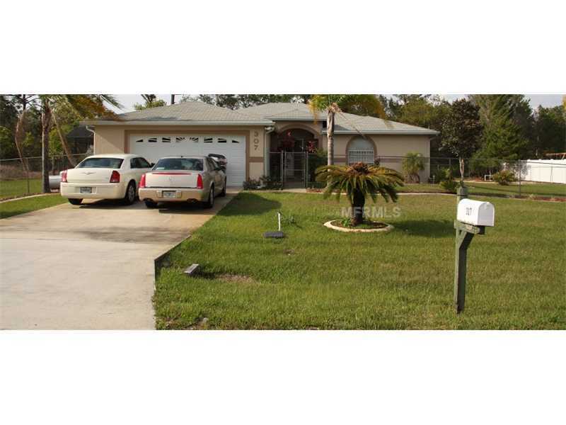 Property Photo:  307 Gardenia Court  FL 34759 