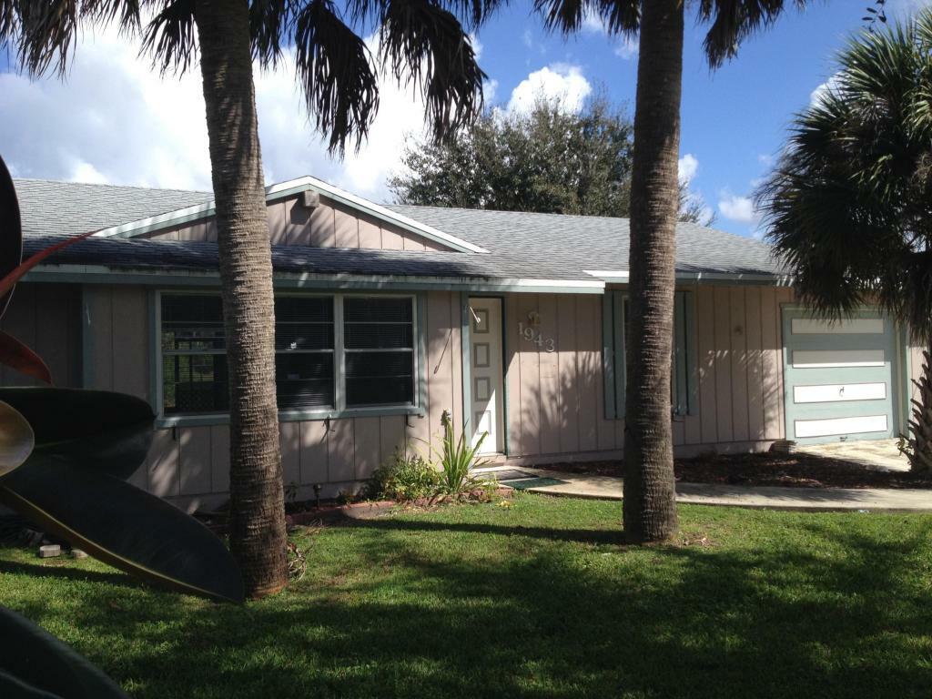 Property Photo:  1943 SW Import Drive  FL 34953 