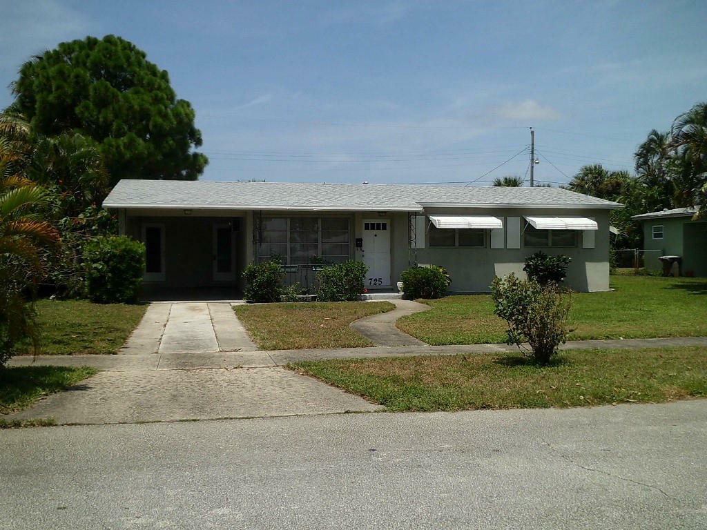 Property Photo:  725 Date Palm Drive  FL 33403 