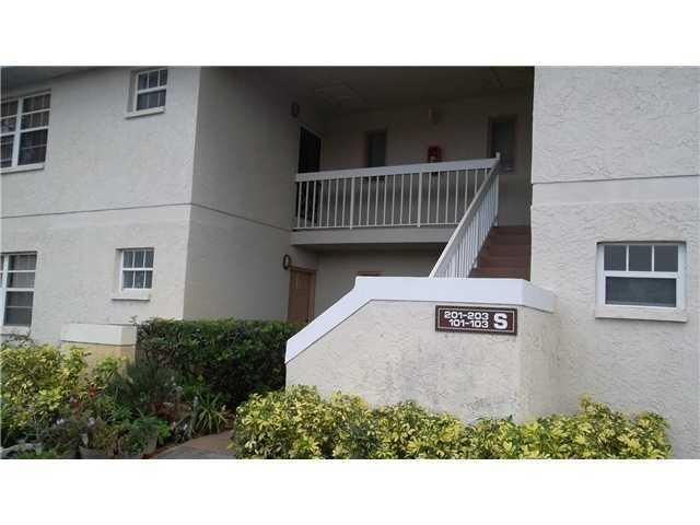 Property Photo:  1529 SE Royal Green Circle 203  FL 34952 