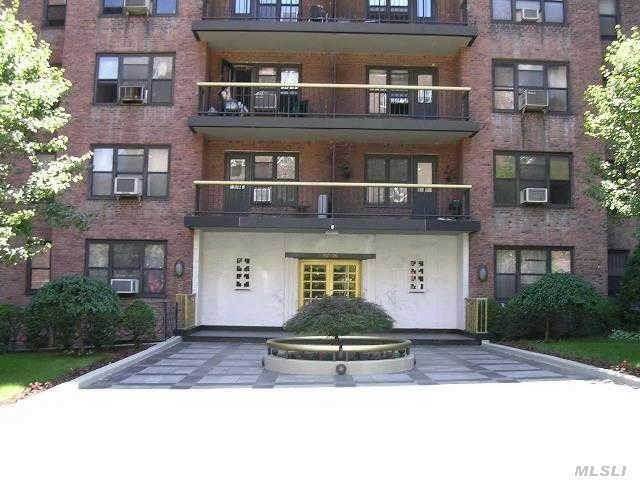 Property Photo: 67-76 Booth St 3I NY 11375