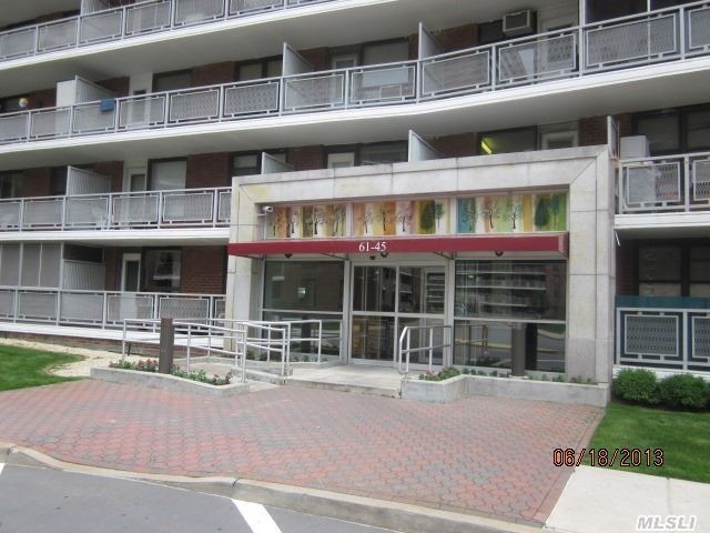 Property Photo: 61-15 98 St St-H NY 11374