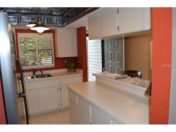 Property Photo: 931 Capri Isles Boulevard 31 FL 34292