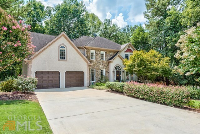 Property Photo:  415 Holly Stream Trl  GA 30075 