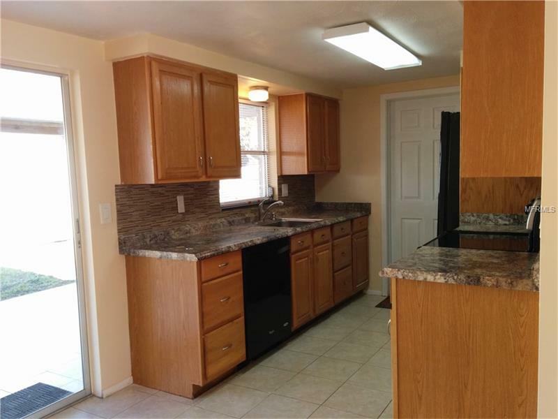 Property Photo: 7741 Birchwood Drive FL 34668