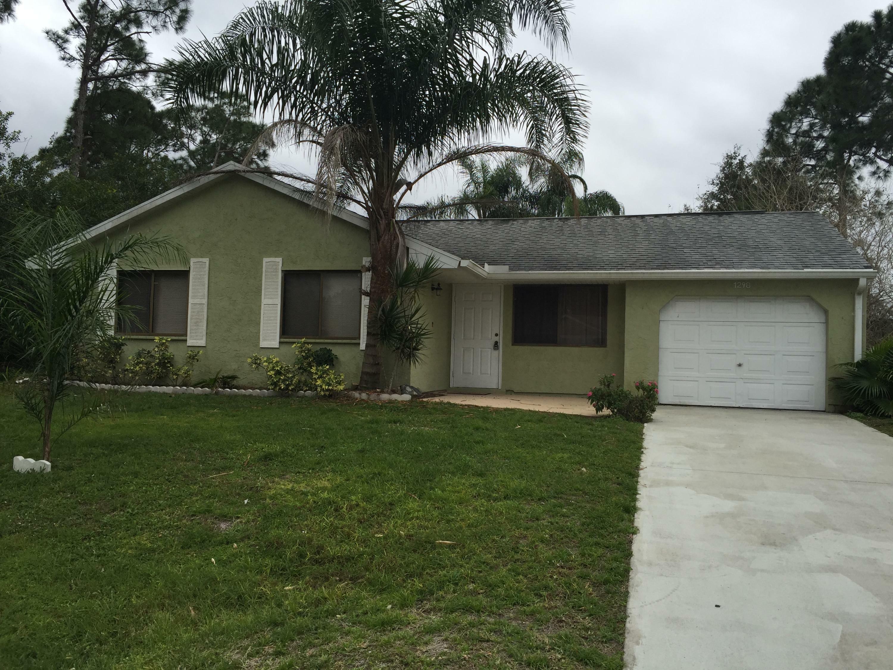 Property Photo:  1298 SW Fountain Avenue  FL 34953 