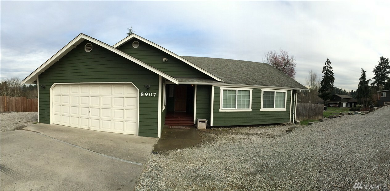 Property Photo:  8907 Woodland Avenue E  WA 98371 