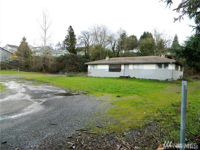 Property Photo:  128 E Marginal Wy S  WA 98168 