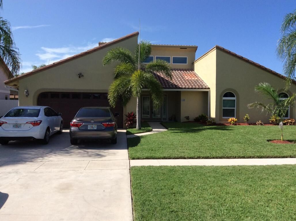 Property Photo:  359 S Country Club Boulevard  FL 33487 