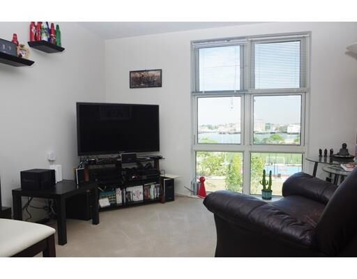 Property Photo:  113 Sumner St 55  MA 02128 