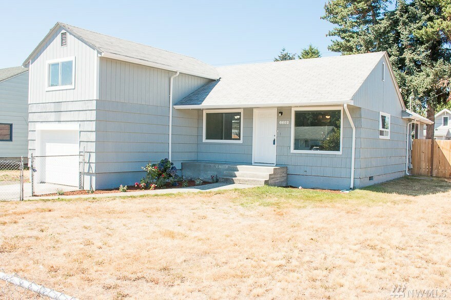 Property Photo:  6602 S Wapato St  WA 98409 