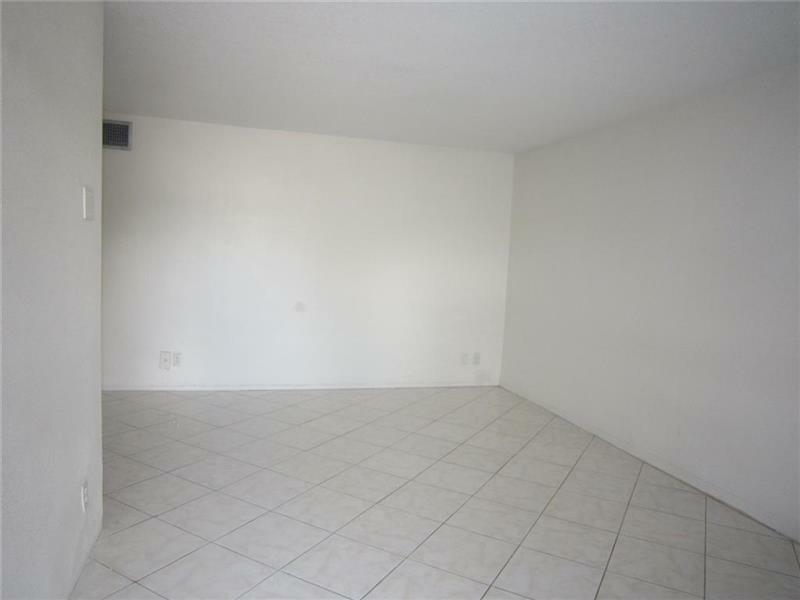 Property Photo:  400 SE 3 Av 104  FL 33009 