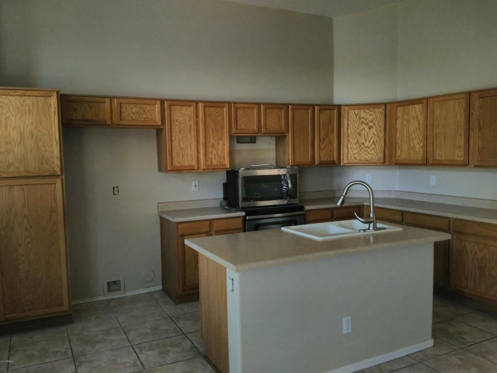 Property Photo:  15886 W Adams Street  AZ 85338 