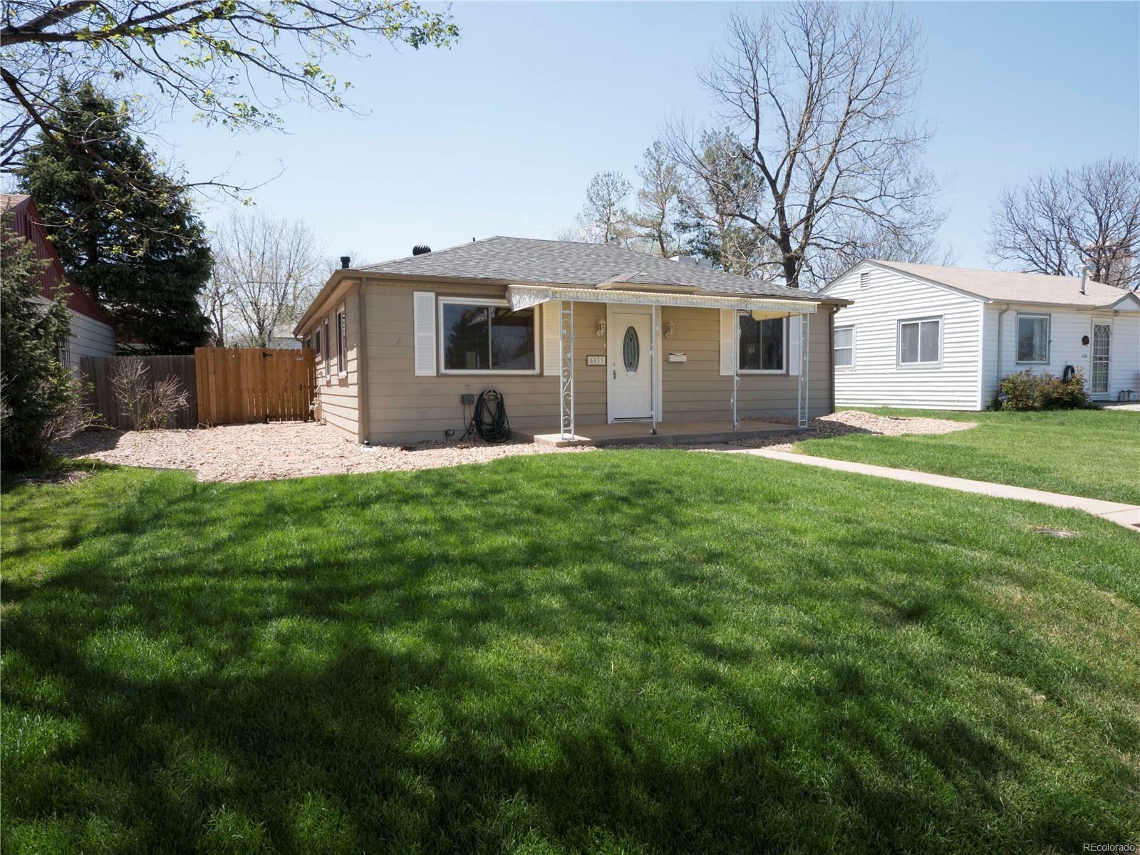 Property Photo:  5033 Wyandot Street  CO 80221 