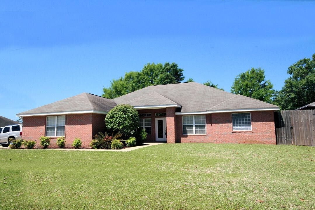 Property Photo:  104 Marimba Street  FL 32569 