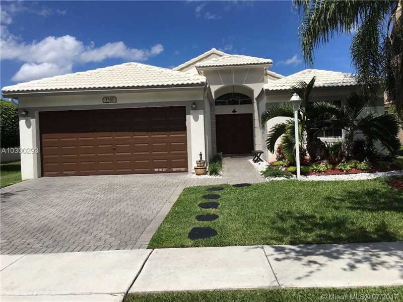 Property Photo: 1561 NW 132nd Ave FL 33028