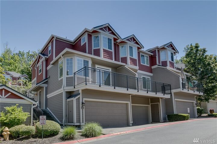 Property Photo:  2840 139th Ave SE 18  WA 98005 