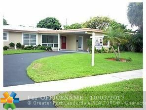 Property Photo:  2180 NE 61st Ct  FL 33308 