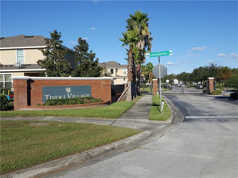 Property Photo:  9823 Tivoli Villa Drive  FL 32829 