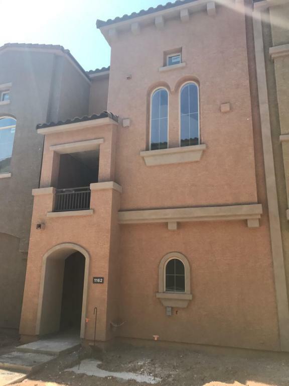 Property Photo:  240 W Juniper Avenue 1209  AZ 85233 