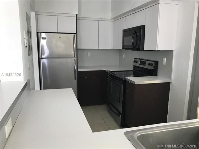 Property Photo:  6835 Rue Versailles 205  FL 33141 