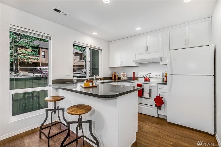 Property Photo:  10819 NE 37th Place 104  WA 98004 