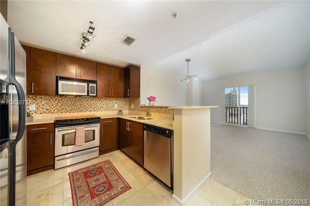 Property Photo:  10 Aragon Ave 1209  FL 33134 