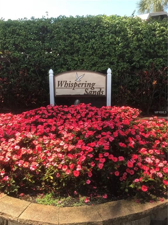 Property Photo:  20 Whispering Sands Drive 203  FL 34242 