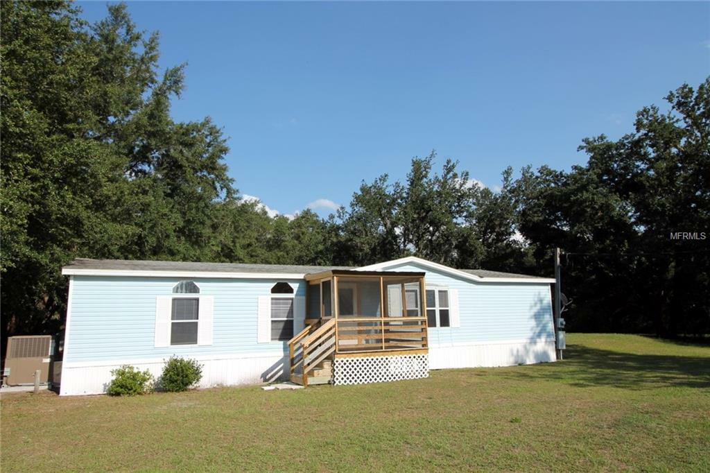 Property Photo:  7640 Evans Avenue  FL 34714 