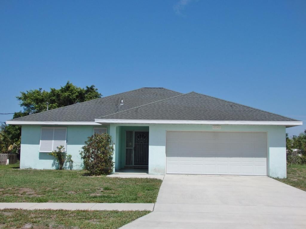 Property Photo:  12043 SE Juno Crescent  FL 33455 