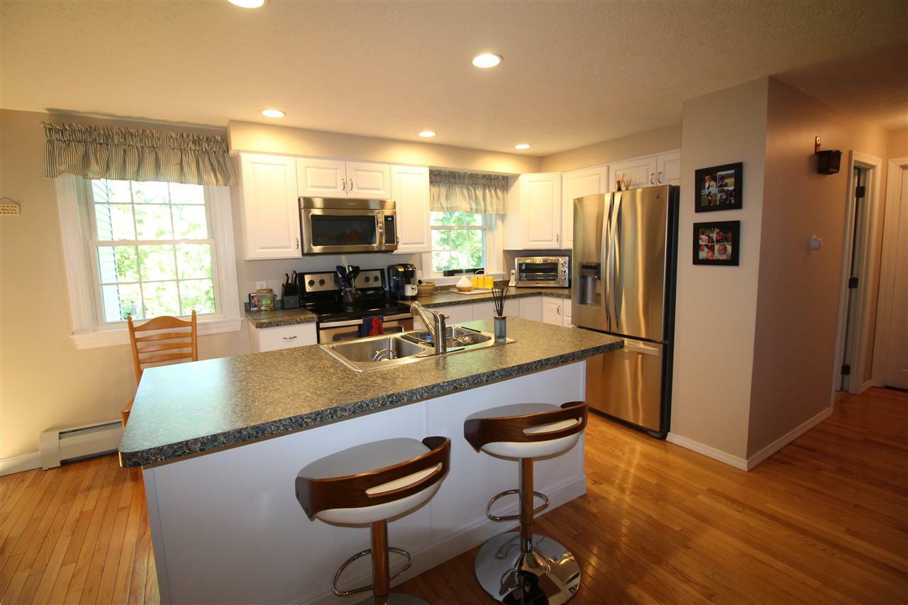 Property Photo: 37 Belmont Drive NH 03054