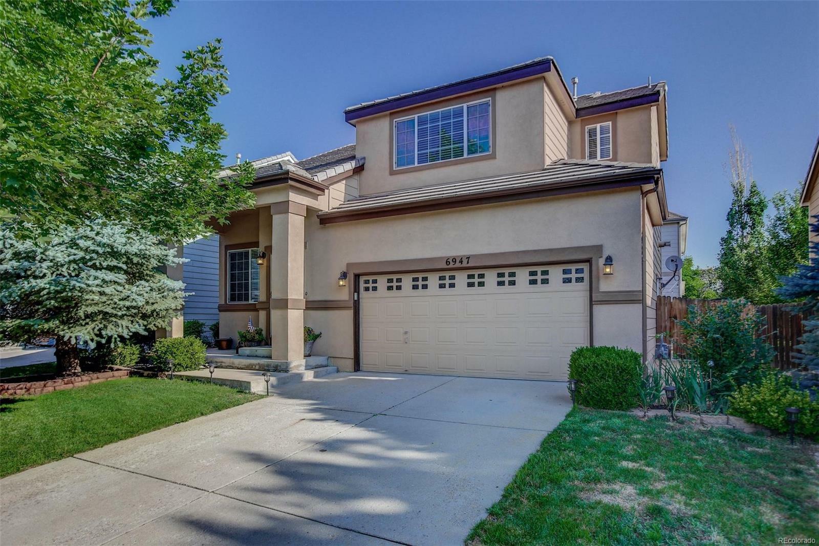 Property Photo:  6947 West Chatfield Place  CO 80128 