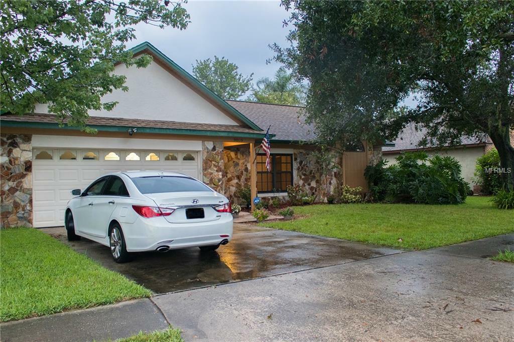 Property Photo:  9809 Peddlers Way  FL 32817 