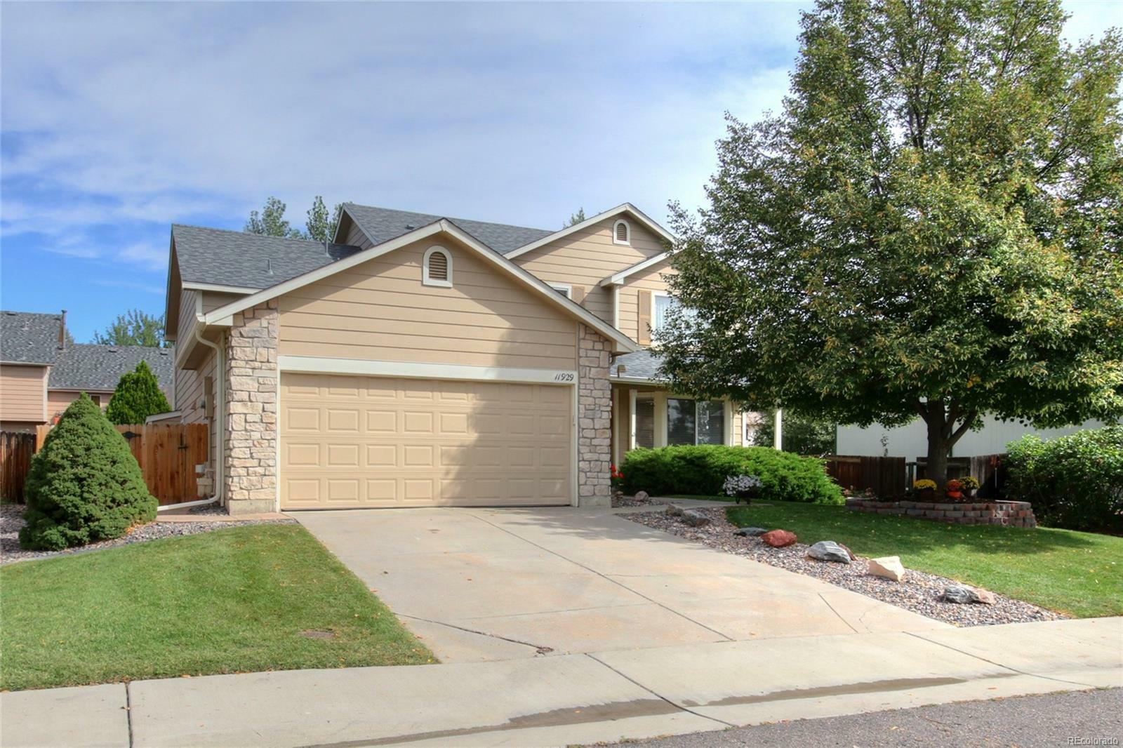 Property Photo: 11929 West Berry Avenue CO 80127