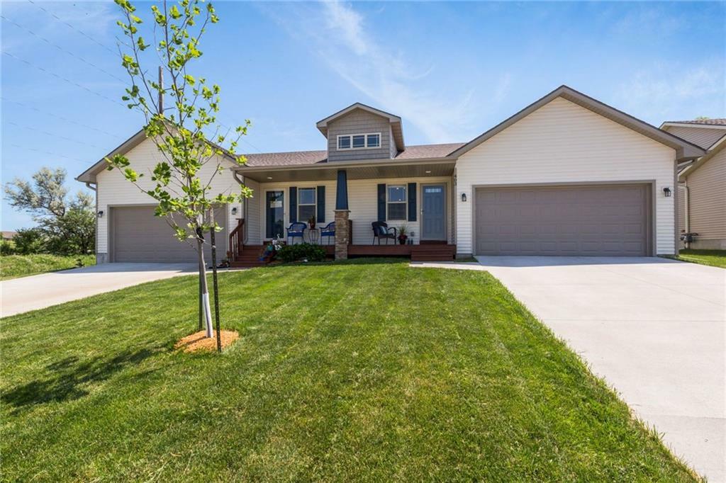 Property Photo:  403 W Centennial Drive  IA 50124 