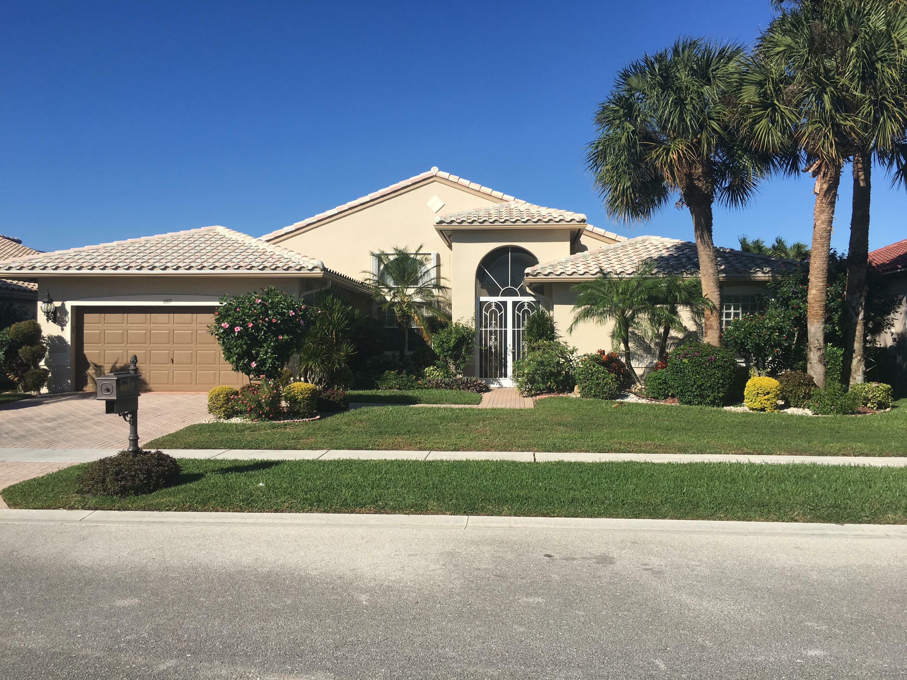 Property Photo:  6817 Treves Way  FL 33437 