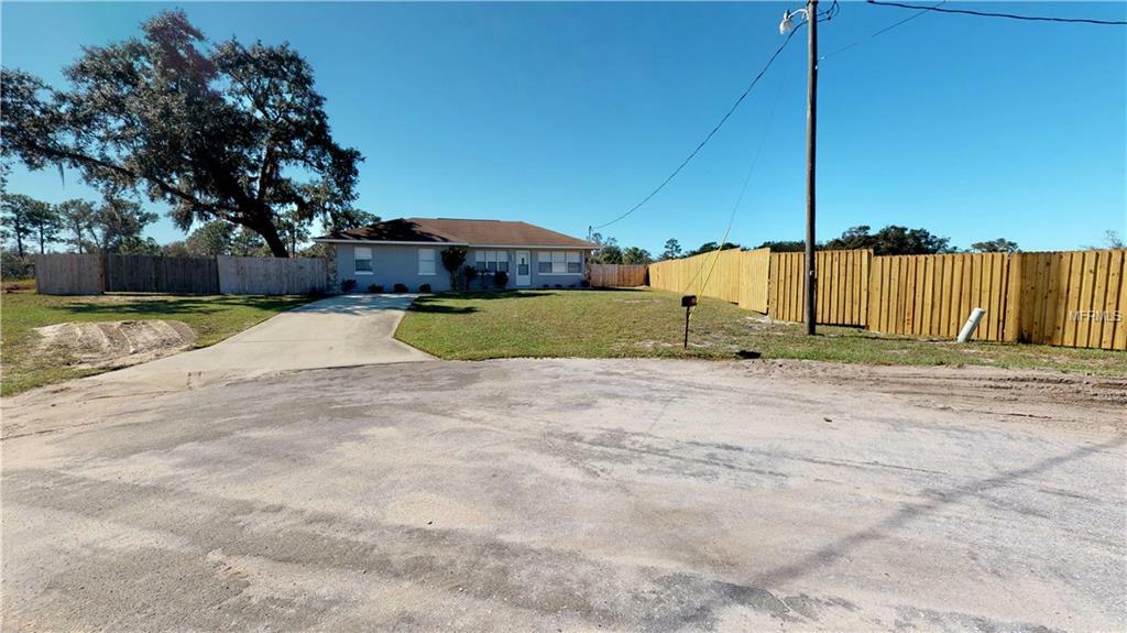 Property Photo:  2624 Rosewood Circle  FL 33898 