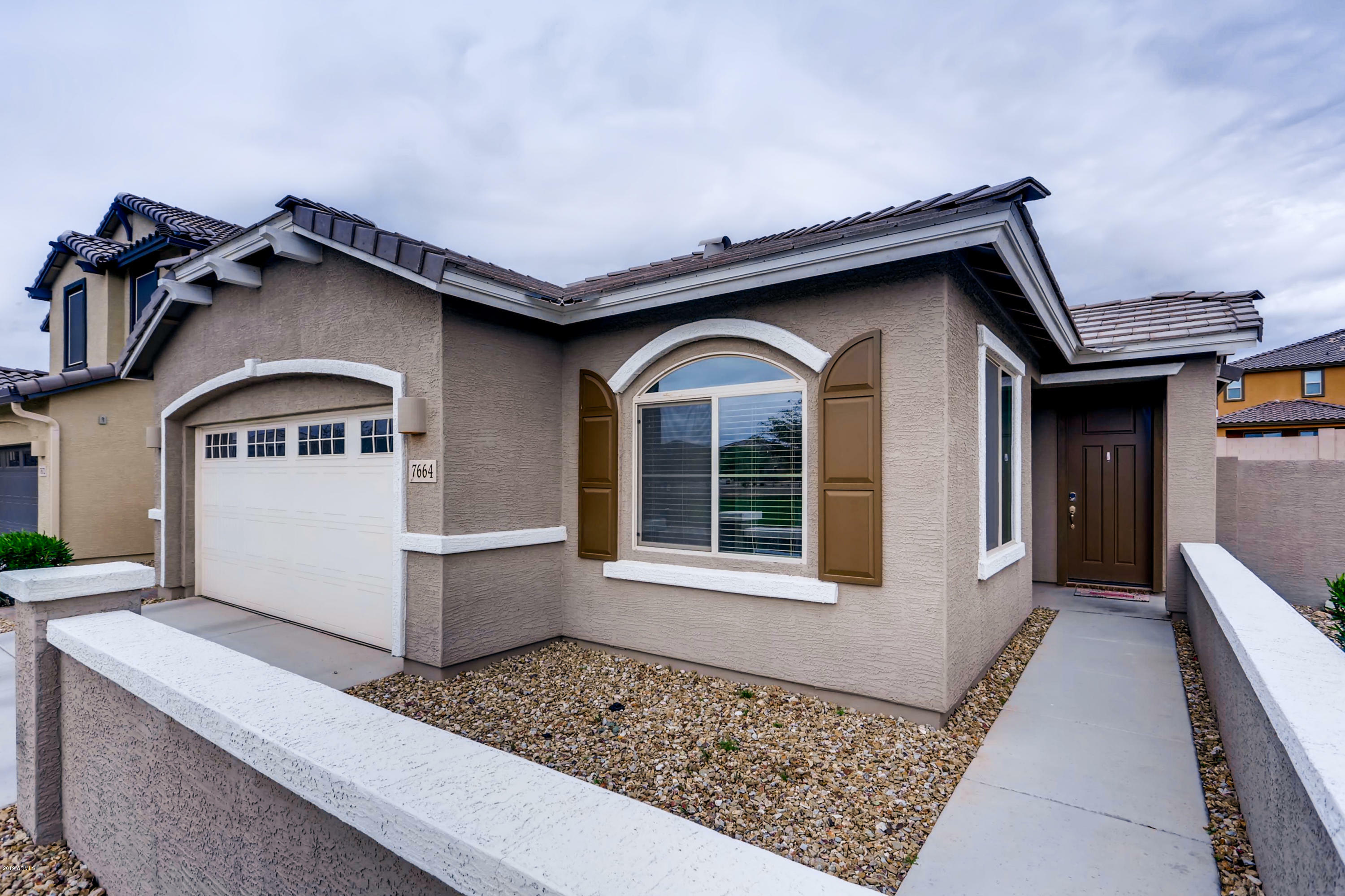 Property Photo:  7664 W Quail Track Drive  AZ 85383 