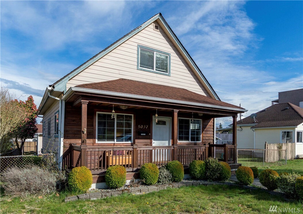 Property Photo:  5037 Yakima Ave  WA 98408 