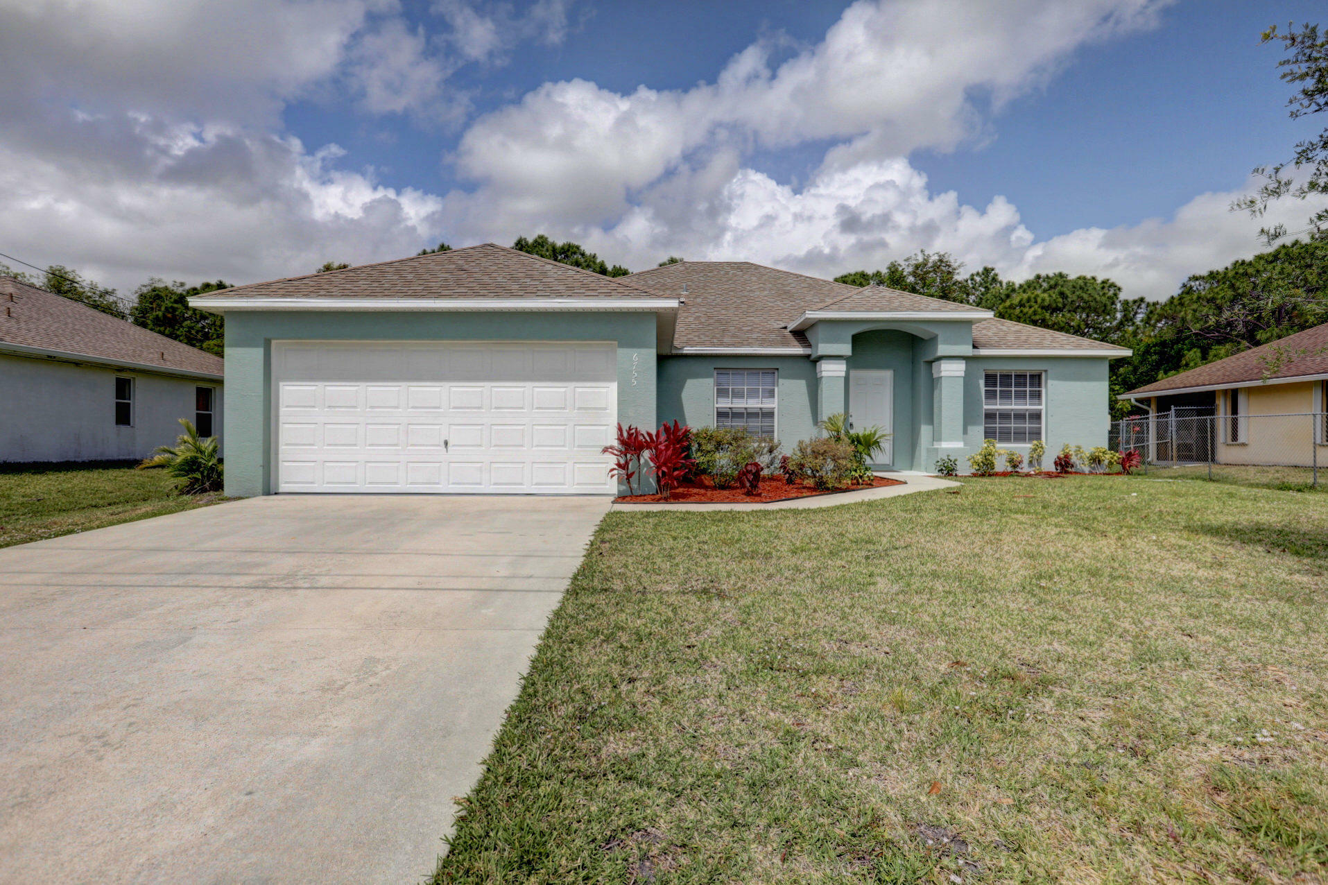 Property Photo:  6755 NW Daffodil Lane  FL 34983 