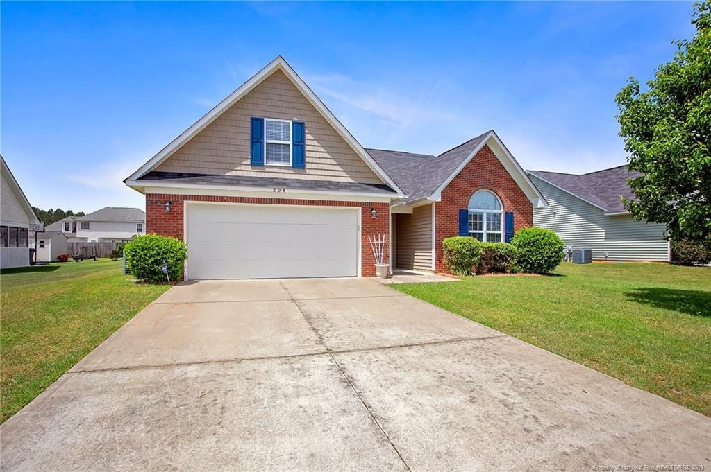 Property Photo:  208 Lochwood Drive  NC 28376 