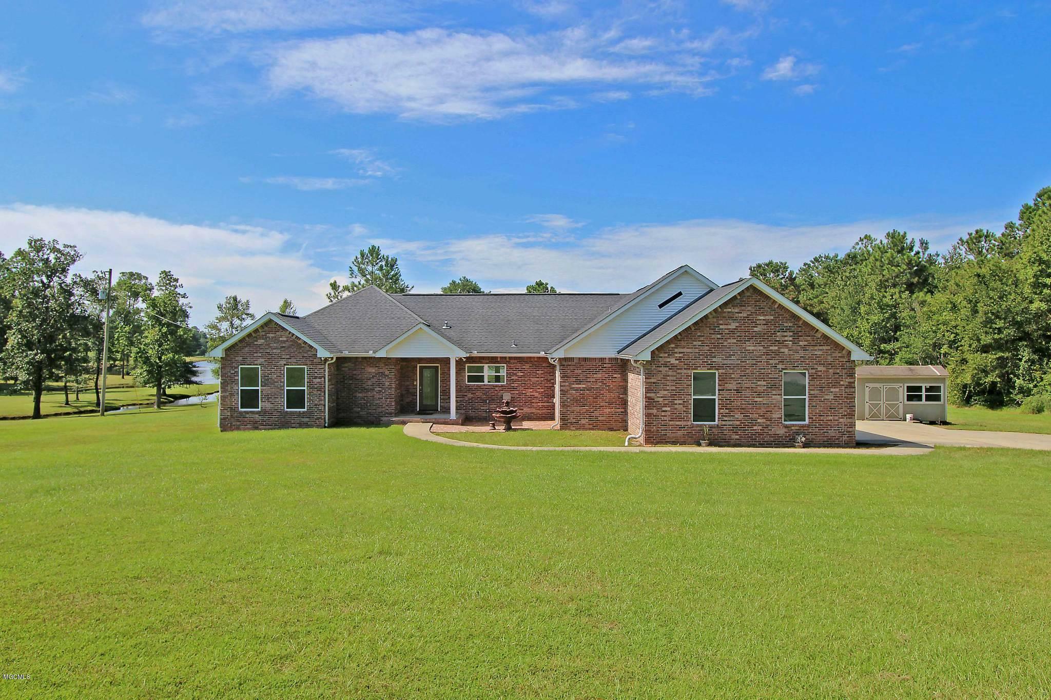 Property Photo: 8153 Lake Cypress Drive East MS 39573