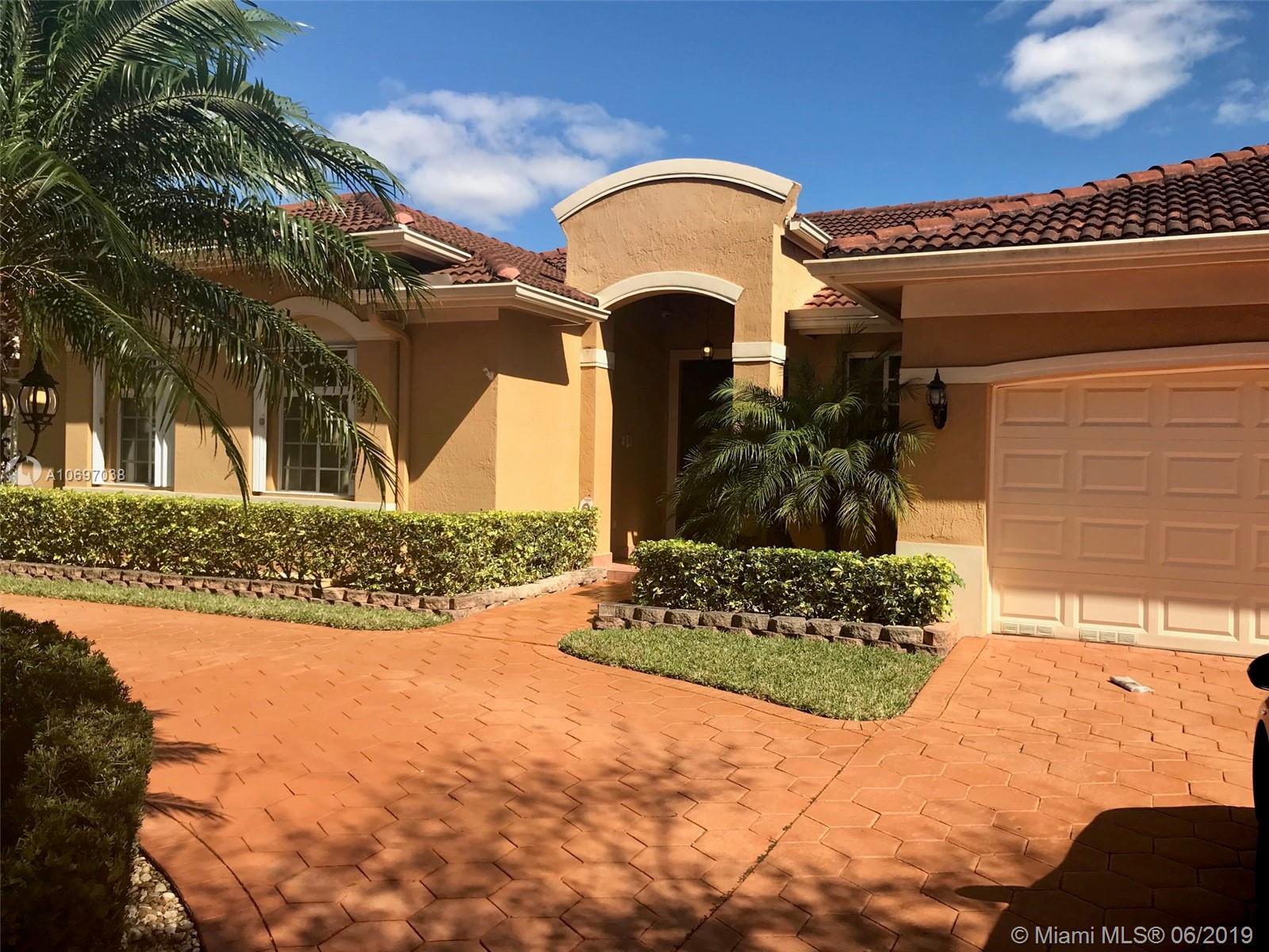 Property Photo: 16805 NW 78th Ave FL 33016