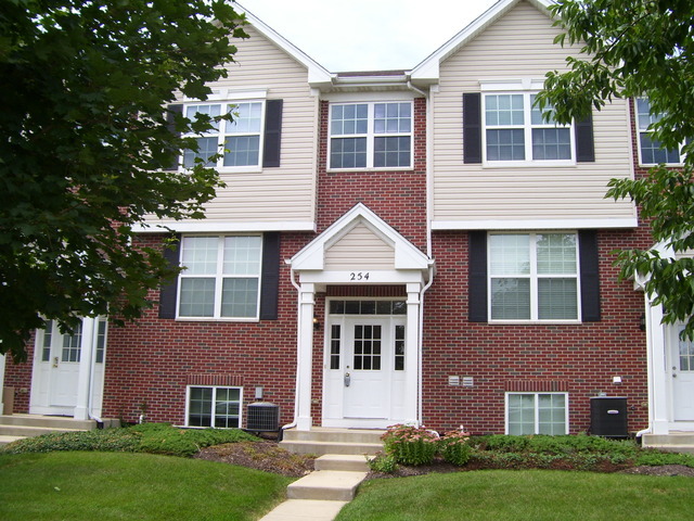 Property Photo: 254 South Alder Creek Drive 1802 IL 60446