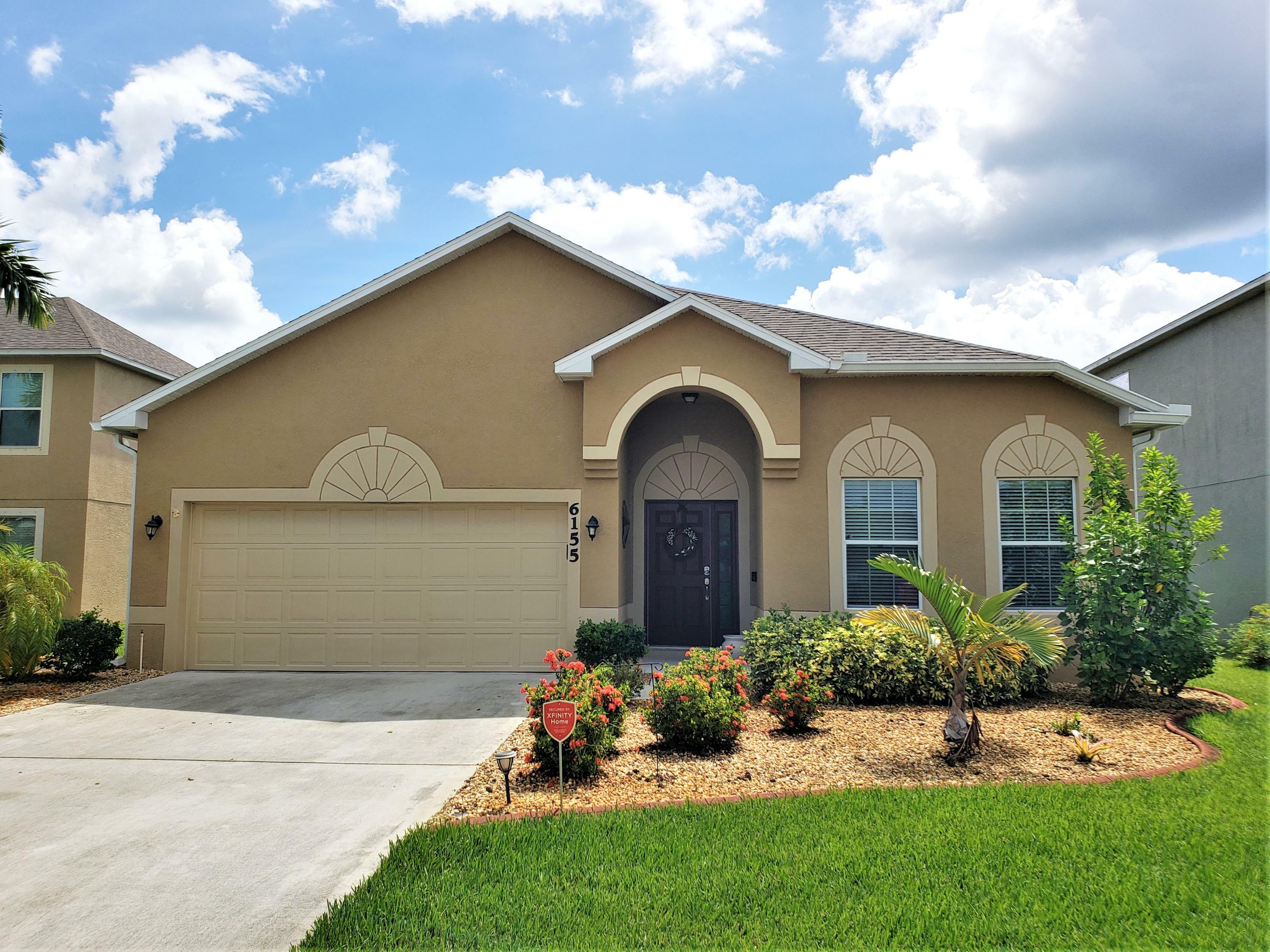 Property Photo:  6155 NW Butterfly Orchid Place  FL 34986 