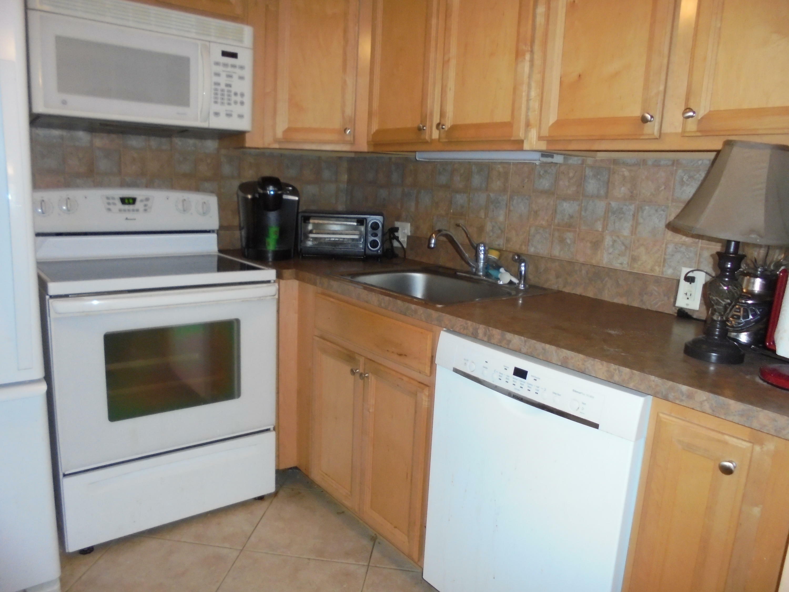 Property Photo:  125 Fanshaw C  FL 33434 