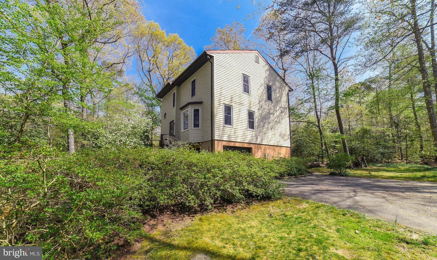 Property Photo:  23112 Piney Wood Circle  MD 20619 